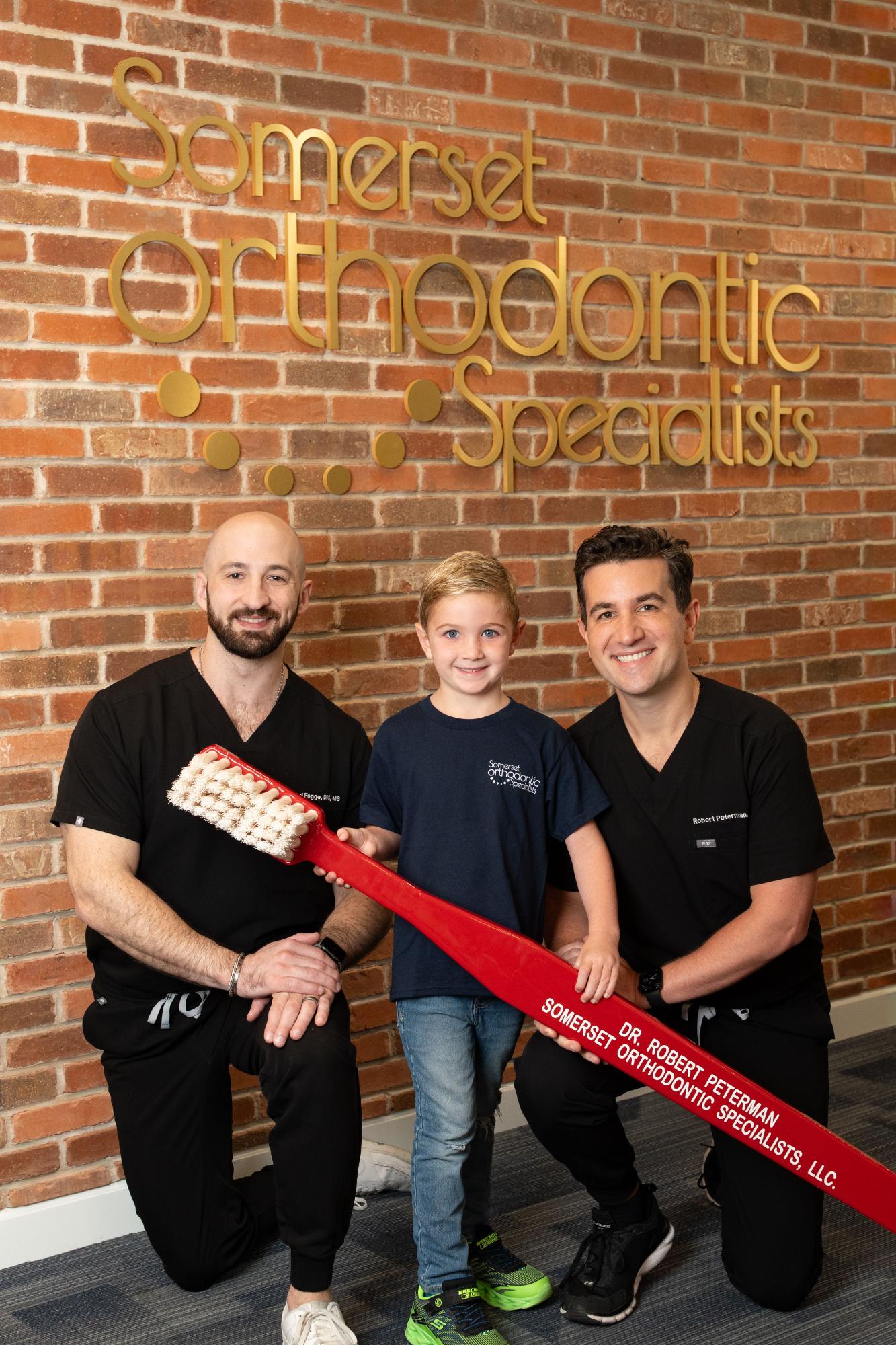 Young patient with Dr. Peterman and Dr. Fogge at Somerset Orthodontic Specialists