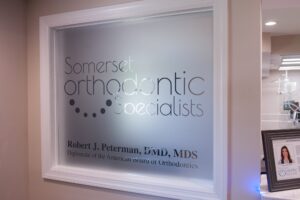 Frosted glass Somerset Orthodontic Specialists sign at the Hillsborough office