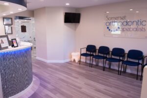 Front desk and waiting area at the Hillsborough orthodontic office
